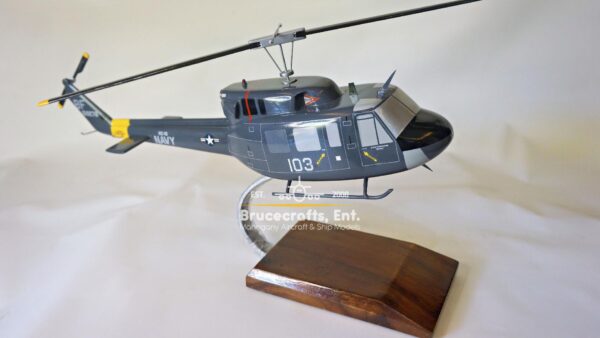 Model of UH-1N Twin Huey US NAVY 103 Aircraft with detailed craftsmanship.